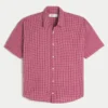 Camisa folgada de manga curta