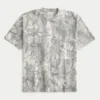 Camiseta boxy pesada com estampa camuflada