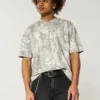 Camiseta boxy pesada com estampa camuflada