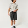 Camiseta boxy pesada com estampa camuflada