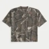 Camiseta boxy pesada com estampa camuflada