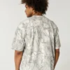 Camiseta boxy pesada com estampa camuflada