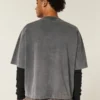 Camiseta de futebol americano com estampa gráfica, estilo universitário, folgada e pesada