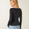 Camiseta de manga comprida com tecido sem costuras e decote redondo