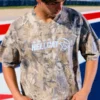 Camiseta larga e pesada com estampa camuflada