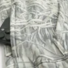 Camisola com capuz quadrada