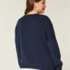 Camisola com estampa de peixe a saltar Camisola com estampa de peixe a saltar