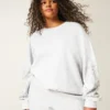 Camisola com estampa gráfica e tachas