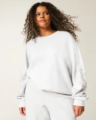 Camisola com estampa gráfica e tachas