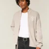 Camisola com fecho e padrão gráfico descontraído