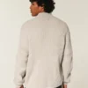 Camisola com fecho e padrão gráfico descontraído