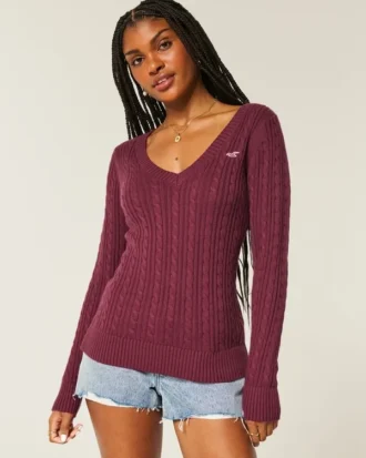 Camisola com gola em V e malha trançada