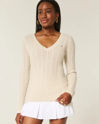 Camisola com gola em V e malha trançada