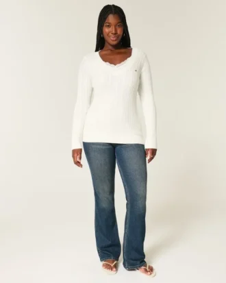 Camisola com gola em V e malha trançada