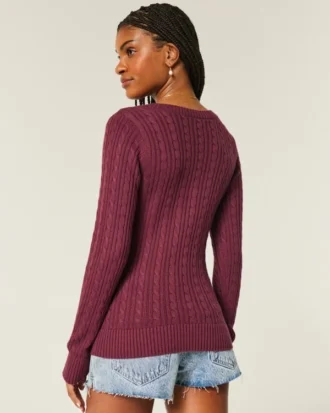 Camisola com gola em V e malha trançada