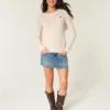 Camisola com gola redonda e padrão em malha trançada