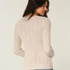 Camisola com gola redonda e padrão em malha trançada