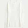 Camisola com gola redonda e padrão trançado