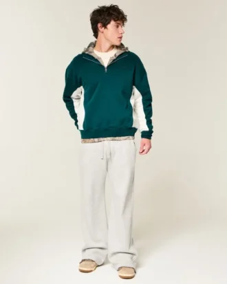 Camisola com logótipo e fecho de correr até um quarto