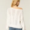 Camisola com mangas com laços e padrão trançado