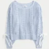 Camisola com mangas com laços e padrão trançado
