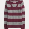 Camisola icónica com gola em V e malha trançada