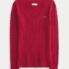 Camisola icónica com gola em V e malha trançada