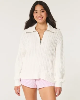 Camisola oversized com malha trançada e meio fecho