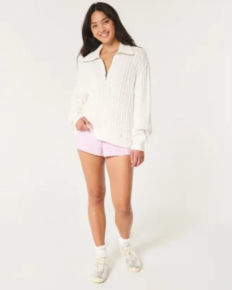 Camisola oversized com malha trançada e meio fecho