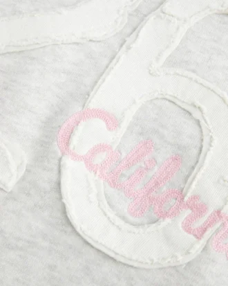 Capuz com forro de pele sintética Capuz com estampado