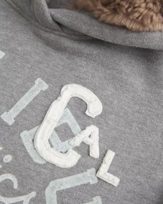 Capuz com forro de pele sintética Capuz com estampado