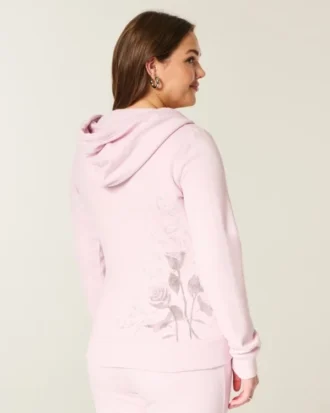 Casaco com capuz e fecho com estampado de rosas