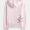 Casaco com capuz e fecho com estampado de rosas