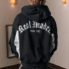 Casaco com capuz e fecho com gráfico do Real Madrid CF