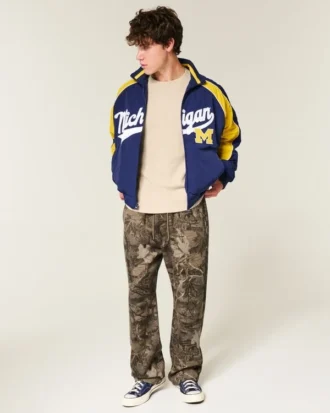 Casaco corta-vento com estampado da Universidade de Michigan Wolverines