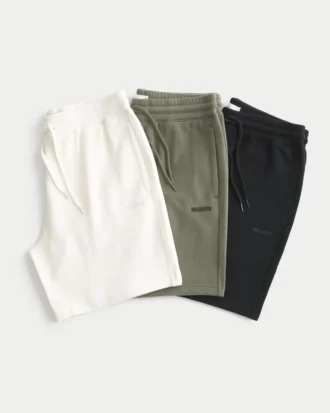 Conjunto de 3 calções de malha com logótipo acima do joelho