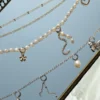 Conjunto de pingentes para cinto