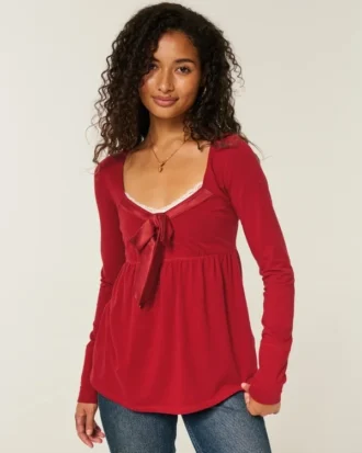Lançamento Holiday Vault Top babydoll em malha com laço frontal em cetim fácil