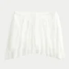 Mini-saia assimétrica com renda Mini-saia assimétrica com renda