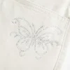 Mini-saia-calça de cintura baixa em sarja brilhante com padrão borboleta Mini-saia-calça de cintura baixa em sarja brilhante com padrão borboleta