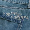 Mini-saia-calça de ganga bordada com lavagem média Mini-saia-calça de ganga bordada com lavagem média
