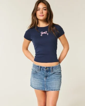 Mini-saia-calça de ganga com cintura baixa e laço bordado