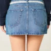 Mini-saia-calça de ganga com laço de renda Mini-saia-calça de ganga com laço de renda
