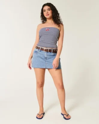 Mini-saia-calça de ganga curvilínea de cintura baixa e lavagem média