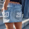Mini-saia-calça de ganga de cintura baixa Classe de ’26
