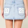 Mini-saia-calça de ganga de cintura baixa Classe de ’26