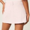 Mini-saia-calça de ganga rosa de cintura baixa
