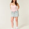 Mini-saia-calça em ganga clara com atacadores