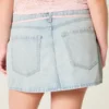 Mini-saia-calça em ganga clara com atacadores