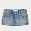 Mini-saia-calça em ganga de cintura ultra baixa